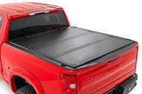 Rough Country | Hard Tri-Fold Flip Up Bed Cover | 5'10" Bed | Chevy/GMC Sierra 1500 (19-26)/Silverado 1500 (19-26)  | 49120580