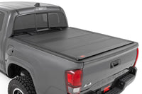 Rough Country | Hard Tri-Fold Flip Up Bed Cover | 5' Bed | Toyota Tacoma 2WD/4WD (2005-2015) | 49415500