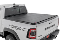 Rough Country | Hard Tri-Fold Flip Up Fold Bed Cover | 5'7" Bed | Ram 1500 (19-26)/1500 TRX (21-24)  | 49320550
