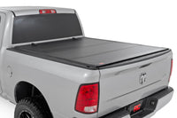 Rough Country | Hard Tri-Fold Flip Up Bed Cover | 5'7" Bed | Ram 1500 2WD/4WD (2009-2018 & Classic) | 49319550