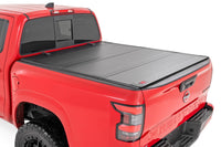 Rough Country | Hard Tri-Fold Flip Up Bed Cover | 5' Bed | Nissan Frontier 2WD/4WD (22-26) | 49520551A